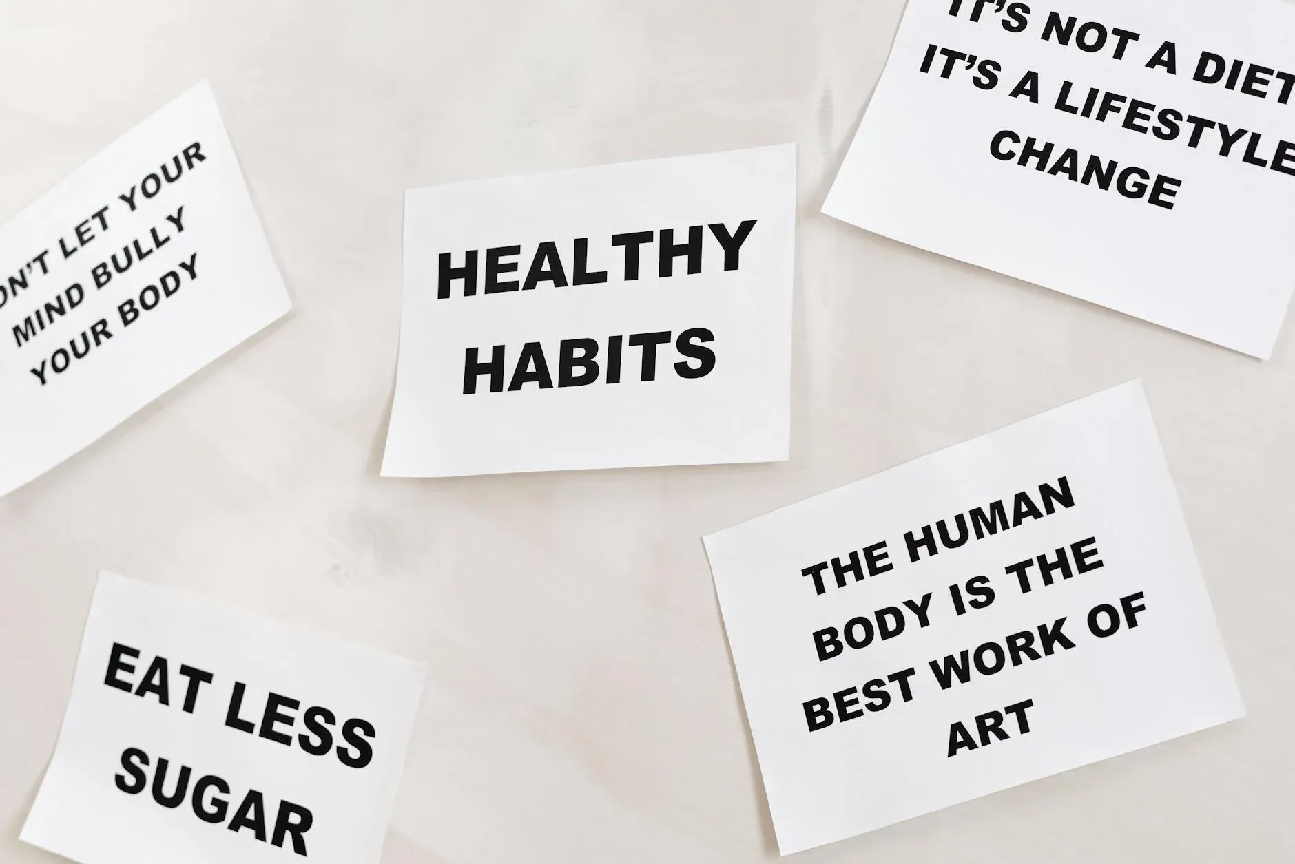 Promotional cards encouraging positive lifestyle changes and healthy habits.