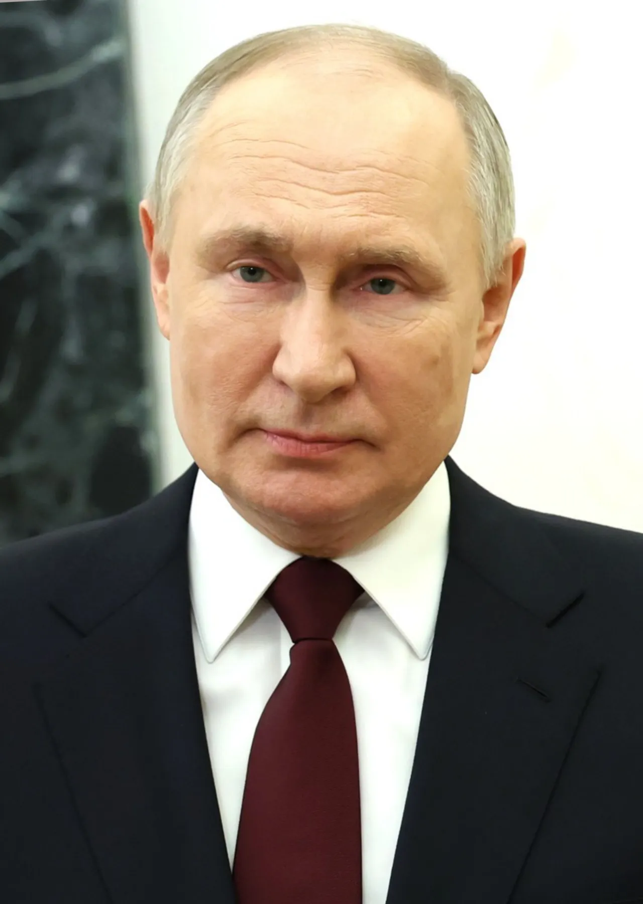 A formal portrait of Vladimir Putin captured on February 23, 2024, highlighting his presidential presence.
